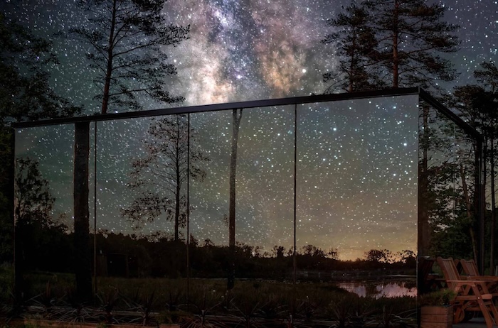 A mirror cabin at night, reflecting stars A mirror cabin at night, reflecting stars