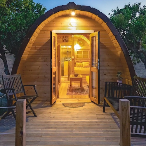 Looking inside a glamping pod front door