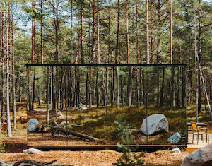 A mirror cabin for glamping in a forest