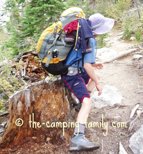 boy with loaded backpack