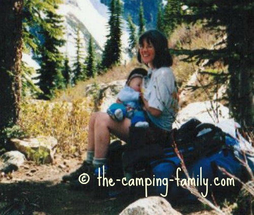 feeding baby on trail