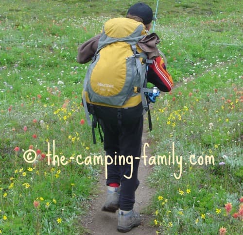 backpacker with fishing rod