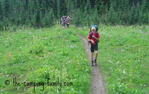 backpackers in meadow