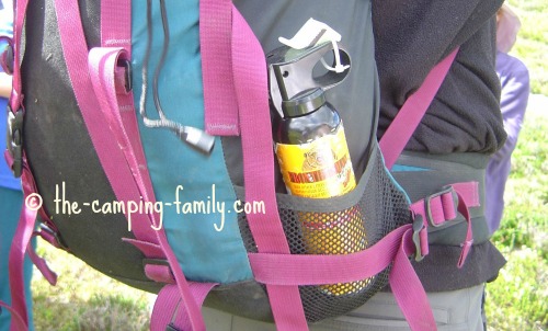 bear spray in outside pocket of backpack