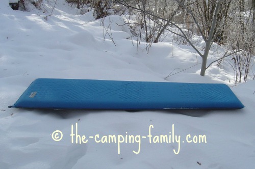 blue thermarest on snow