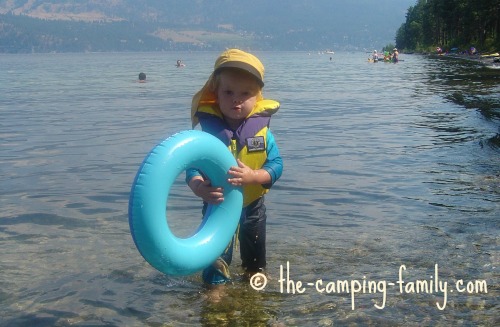 small boy wearing PFD