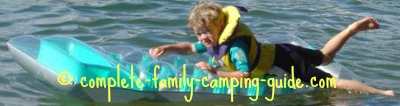 boy playing on air mattress