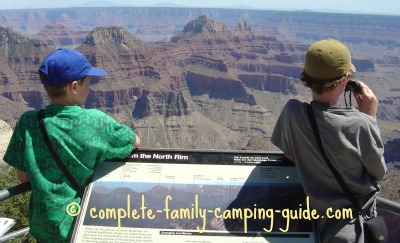 Two young boys looking out at the Grand Canyon Two young boys looking out at the Grand Canyon