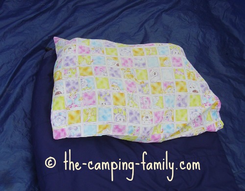 pillowcase stuffed with clothing