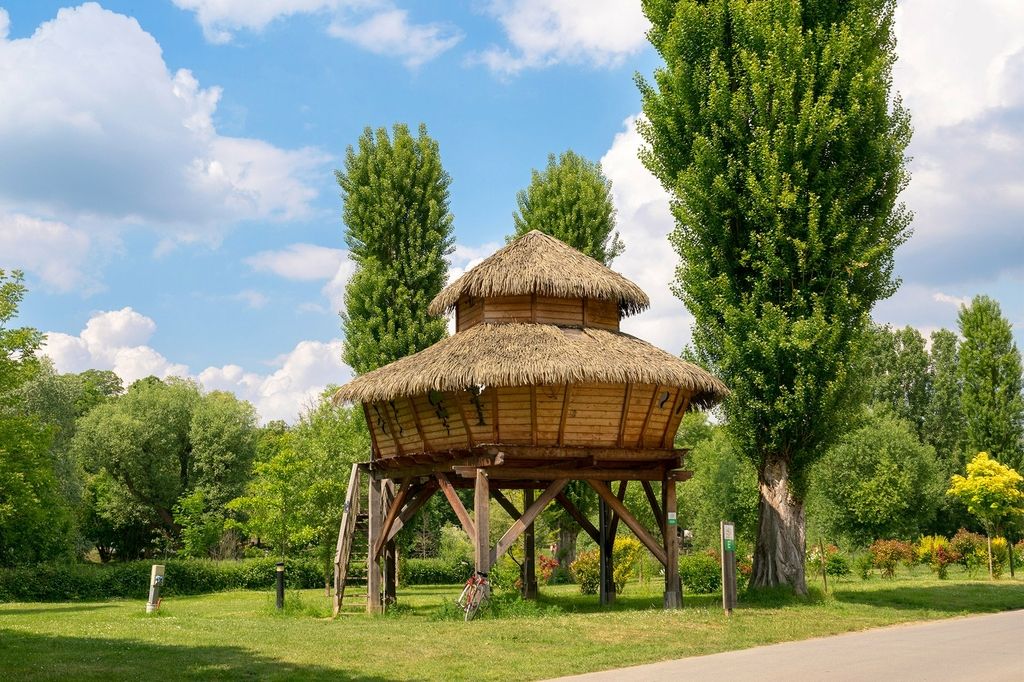 A house on stilts on a campsite