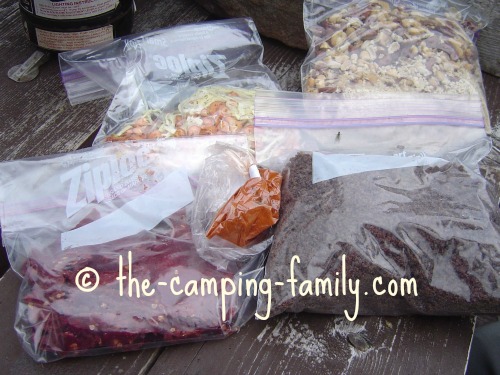 ziploc bags with chili ingredients at camp