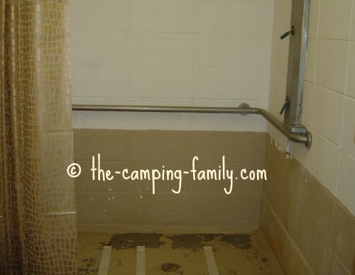 shower stall with stains on the floor