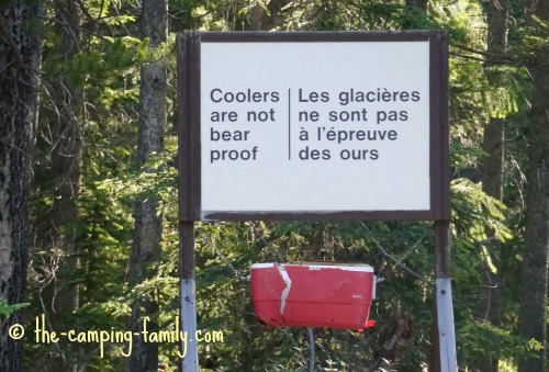 sign that says "coolers are not bear proof"