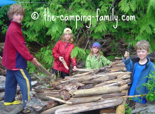 children making driftwood fort