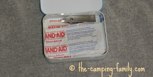 bandaids in Altoids tin