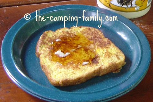 French toast on plate with maple syrup