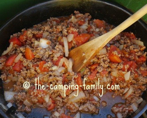 hamburger, rice and tomatoes in skillet