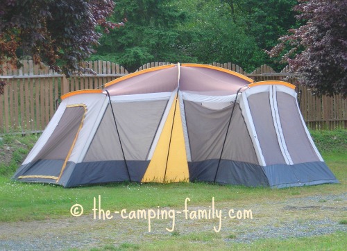 large tent with many poles in sleeves