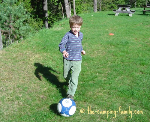 boy playing soccer