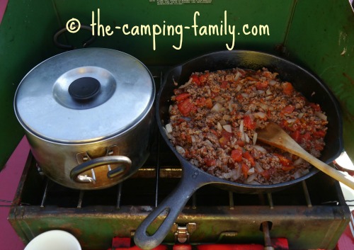 camping stove with pot and skillet