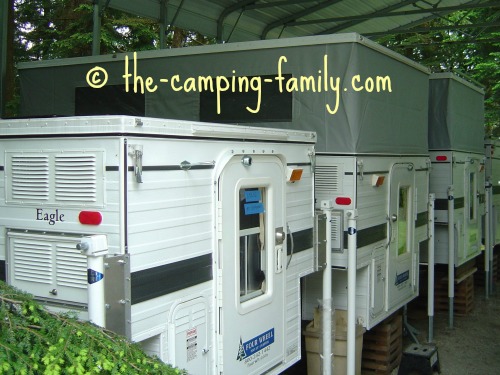 row of popo up truck campers