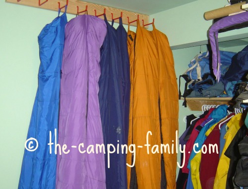 sleeping bags hanging on hooks