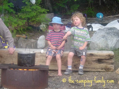 boys roasting marshmallow