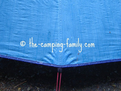 raindrops flowing down tent fly