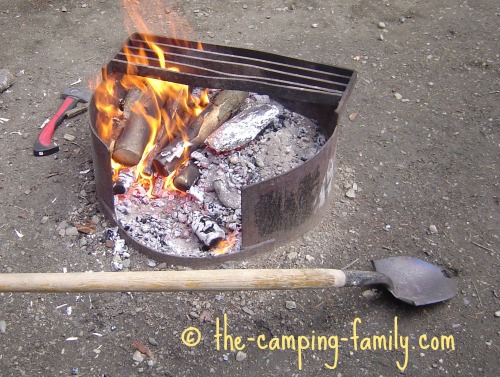 campfire and long handled spade