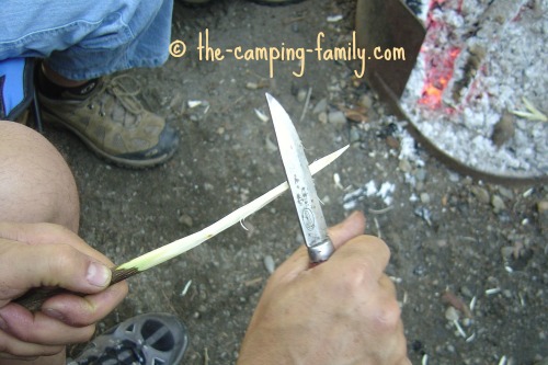 whittling a marshmallow stick