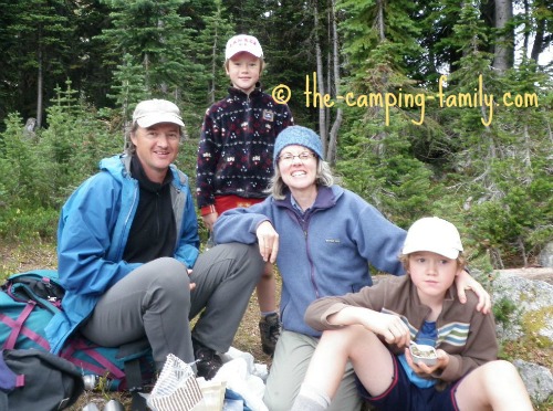 backpacking family stopped for lunch
