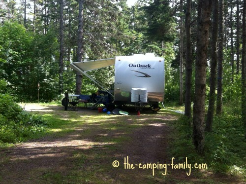 trailer in wooded campground