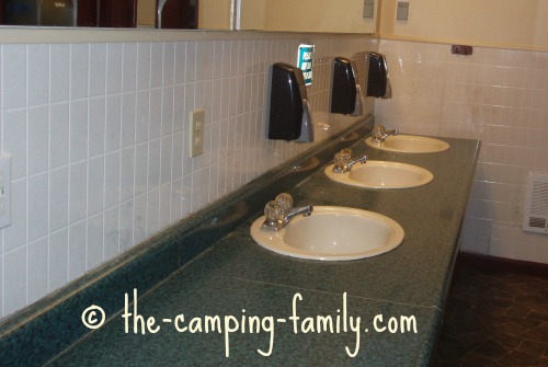 counter with sinks in camp bathroom