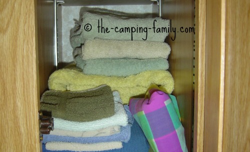towels in RV cupboard