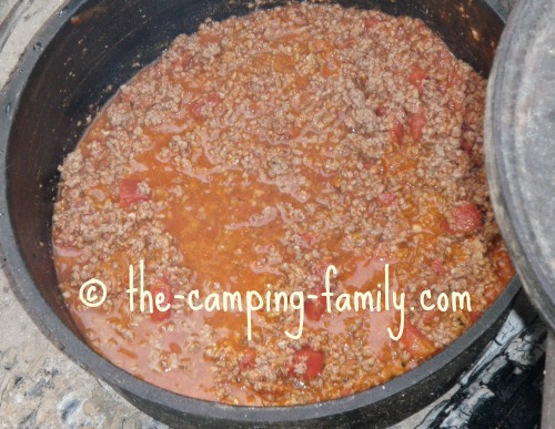ground beef and tomato sauce in Dutch oven